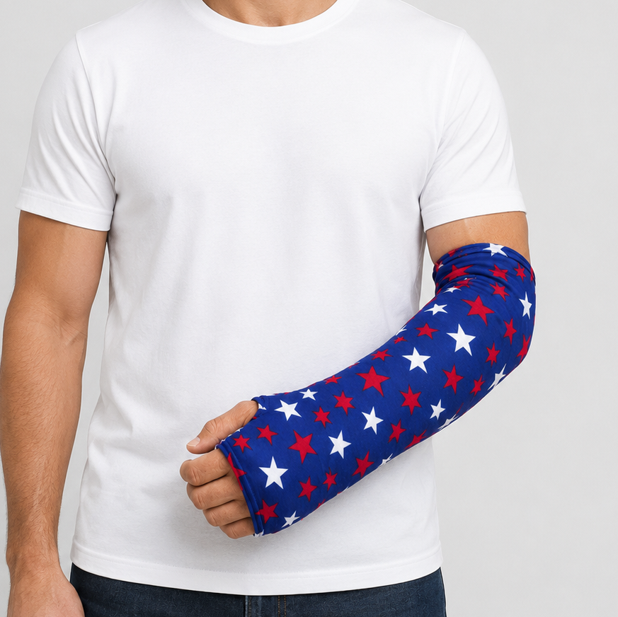 a man wearing a white shirt and a usa patriotic arm cast cover