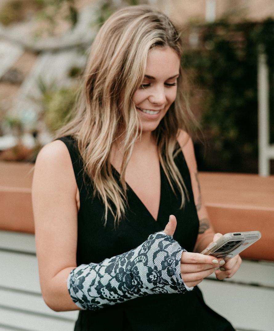 Girl Wearing a CastCoverz Arm Cast Cover During Everyday Recovery